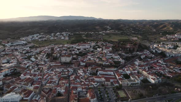 Sprawling fortified city of Silves, Algarve  Panoramic sunset aerial view