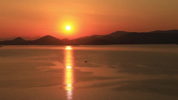 Lonely Yacht Sailing on Silent Sea. Aegina Island, Greece