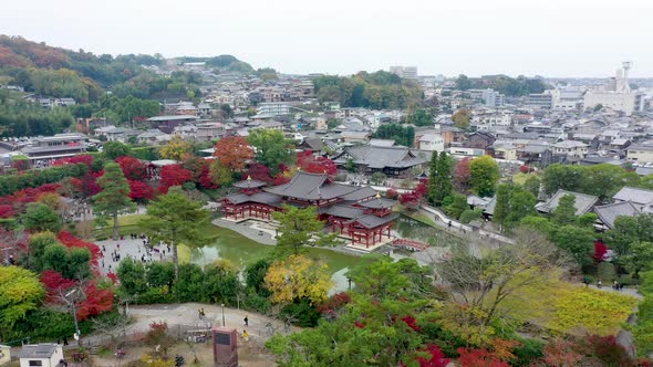 Byodoin temple (Byodo-in) with autumn leaves, Uji City, Kyoto, Japan.