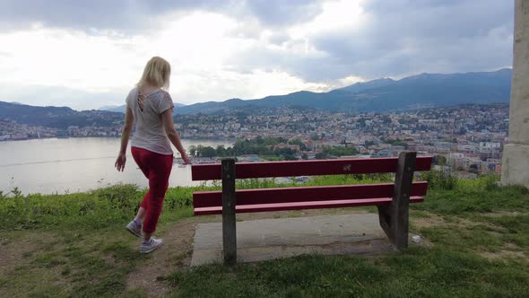 Tourist Girl By Lugano Aerial View