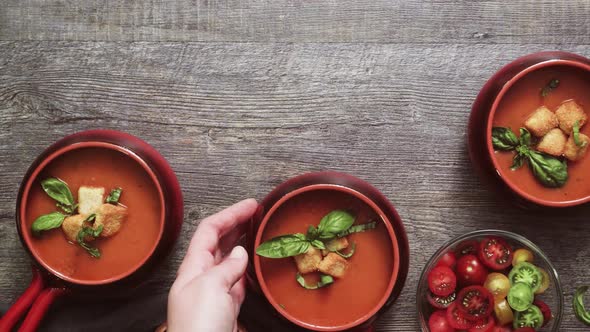 Roasted tomato soup with fresh basil and croutons.