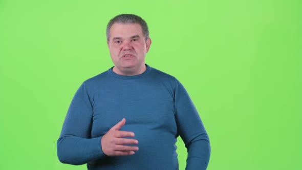 Man Talks About His Company and Its Achievements. Green Screen