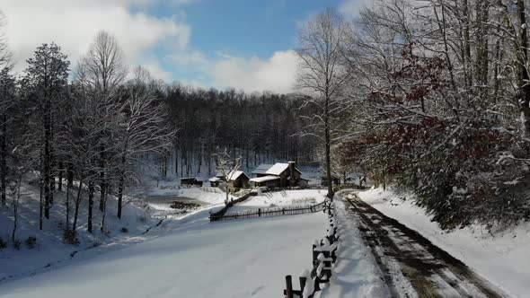 Snow Covered Pioneer Farm Drone Shot