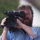 Bearded Television Cameraman Filming Outdoors - VideoHive Item for Sale