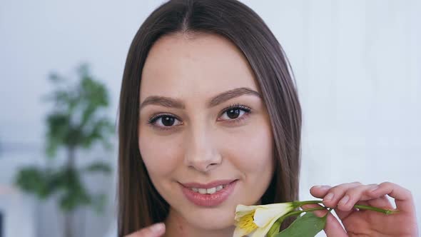 Handsome Caucasian Woman with Flower