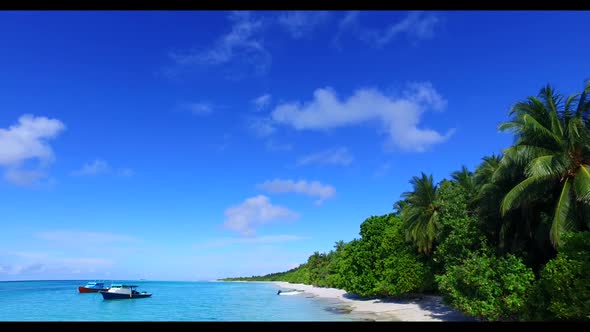 Aerial scenery of idyllic lagoon beach journey by blue sea and white sandy background of a dayout in