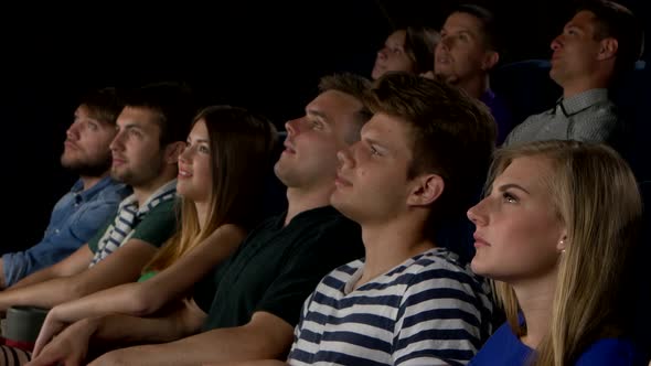 Cinema, Happy Friends Watching Movie in Theater. Close Up