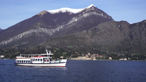 Ferry with Tourists on Board Sails Past the Coast