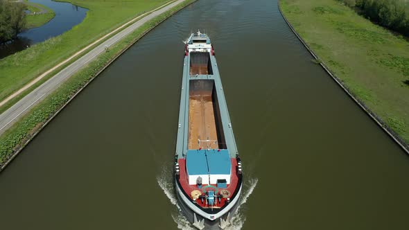 An Empty Barge Boat Sailing In The Calm River Of Gouwe In Zuidelijk Halfrond Zone, South Holland, Ne