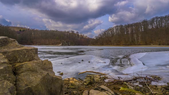 Beautiful time lapse of a frozen lake with a charming sky in the Czech Republic.