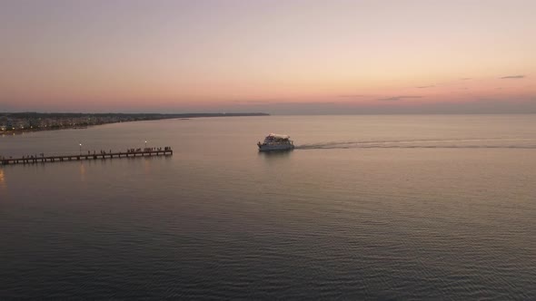 Aerial Flight Above the Sea and Coast Line on the Horizon in Greece