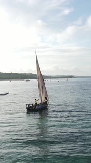 Vertical Video Boats in the Ocean Near the Coast of Zanzibar Tanzania