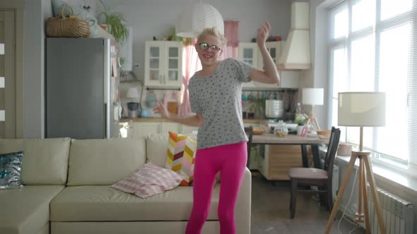 Cute Funny Young Gay Man Wearing Glasses And Bright Clothes