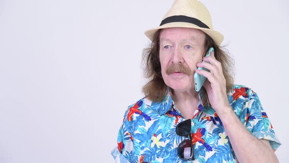 Happy Senior Tourist Man Talking on the Phone