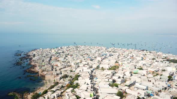 Aerial view over little town over populated of Phan Ri in south Vietnam.