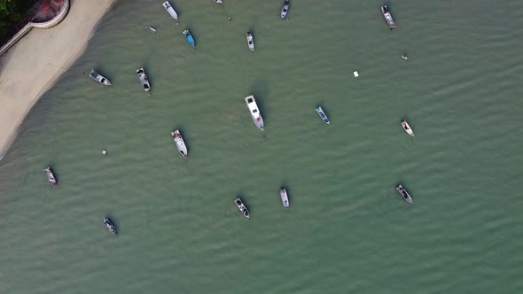 Aerial look down fishing boat park