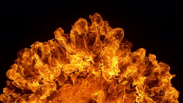 Super Slow Motion Detail Shot of Fire Explosion Against the Black Wall at 1000Fps