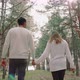 Man and Woman Walking in Forest - VideoHive Item for Sale