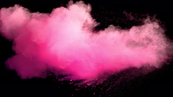 Super Slowmotion Shot of Pink Powder Explosion Isolated on Black Background