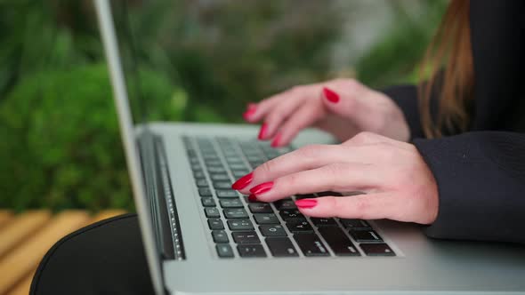 Closeup of Typing Female Hands