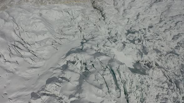 Aerial View of the Amazing Terrain of Everest with Rocky Hills Covered in Snow