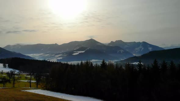 Drone Video with Mountein and Forest and Village in the Winter