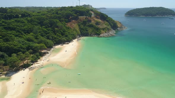 Aerial view drone camera of Beautiful tropical sea sandy beach and waves crashing against sand beach