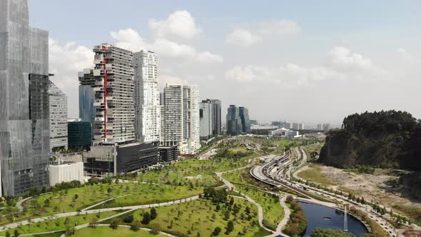 Aerial of the Skyline in Santa Fe, Mexico City Flying over La Mexicana Park