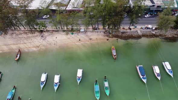 Fishing Boats at Anchor Along a Tropical Coastline Aerial