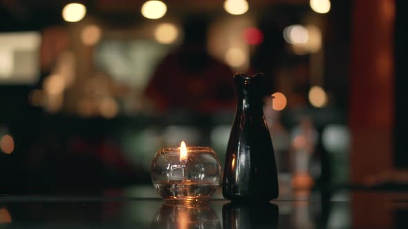 Candle on Table in a Restaurant