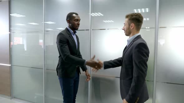 Two Business Partner Shake Hands When Meeting