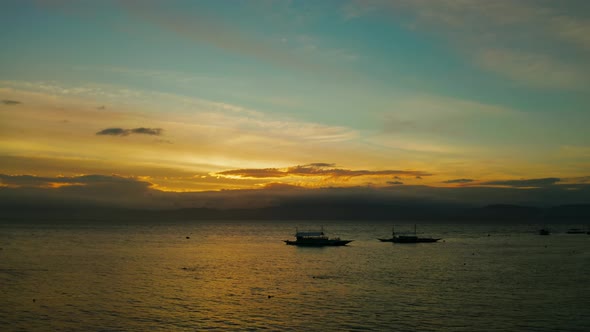 Cloudy Sky Over the Sea During Sunset alt