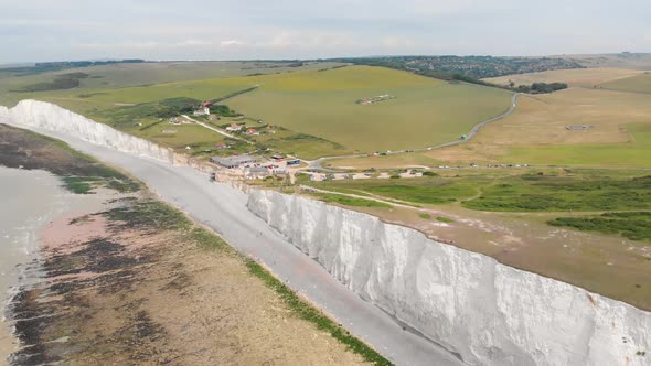 Aerial footage of the famous Seven Sisters chalk cliffs tops by the English Channel in the UK