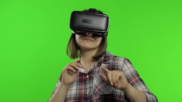 Woman Using VR Headset Helmet To Play Game, Dance. Watching Virtual Reality 3d Video. Chroma Key