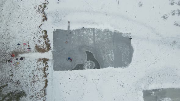 Children Ice Skating In Winter Lake alt