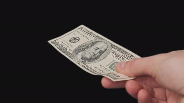 100 American Dollar in Male Hand with Alpha Channel