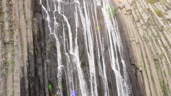 Aerial View to the Wild Mountain Waterfall From Top to Bottom