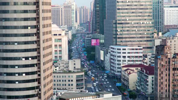 Traffic on Chinese Street Past Shanghai Buildings Timelapse