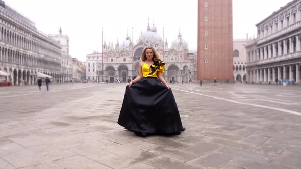 Gorgeous Lady in Fashionable Carnival Dress Walks to Camera