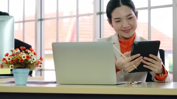 Business People Working at Table in Modern Office