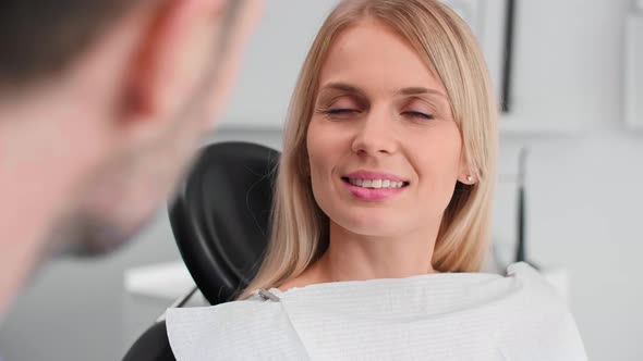 Portrait of Smiling Woman at The Dentist's Office