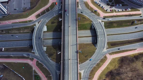 Aerial drone video of circular road junction in the city.