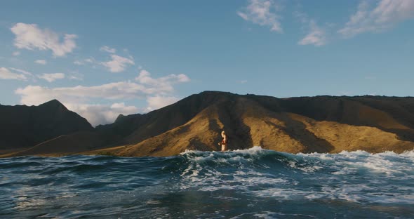 Surfing at sunset