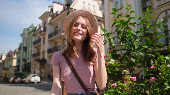 Beautiful Young Woman Tourist Pleasant in the City Center