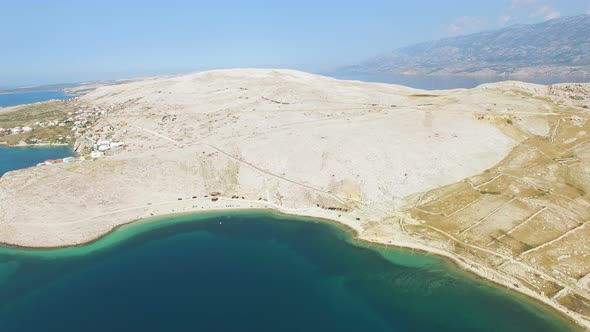 Flying above isolated beach of Pag island, Croatia