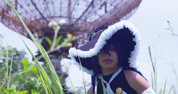 Wendy belserion cosplayer outdoors with a large radio station tower in the background