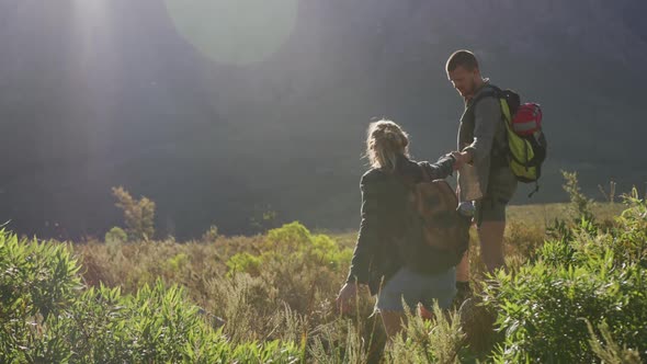 Caucasian couple hiking in nature