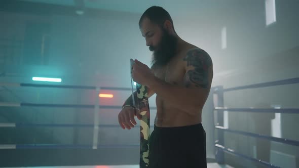 Boxer Wraps his Hands with Hand-Wrap