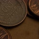 Rotating stock footage shot of American pennies (coin - $0.01) - MONEY 0175 - VideoHive Item for Sale