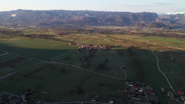 Flying over the countryside on an early spring morning